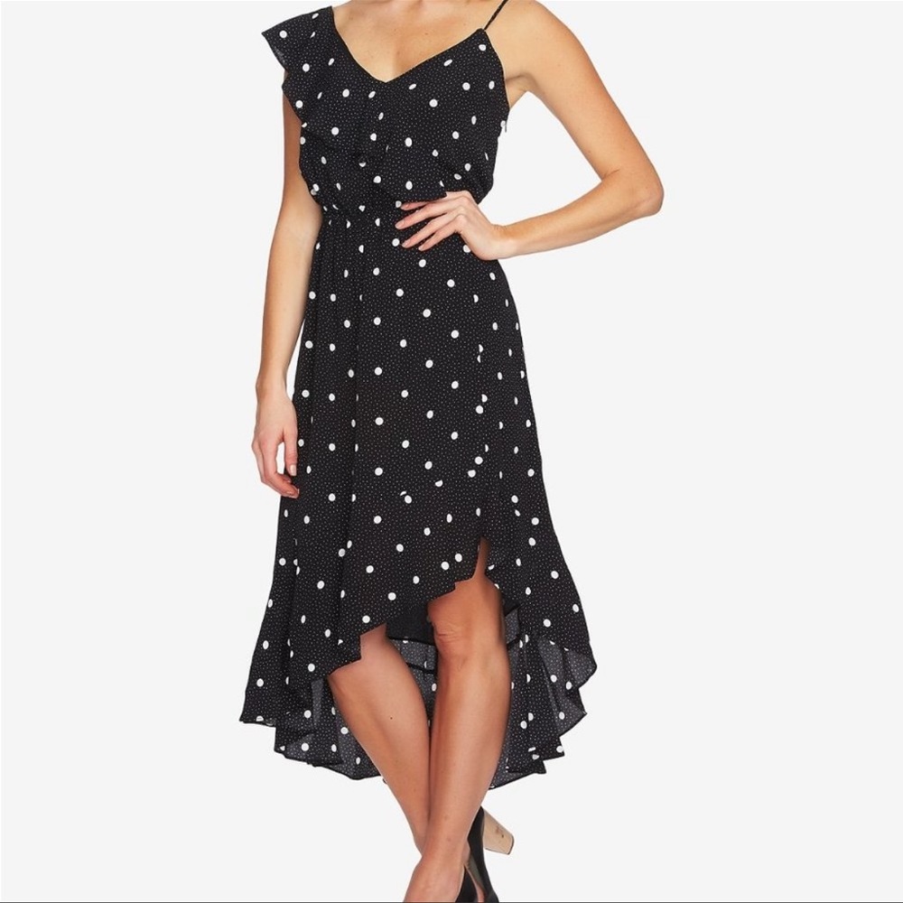 1. State asymmetrical polka dot dress.